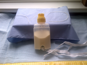 Bottle with feeding tube attached